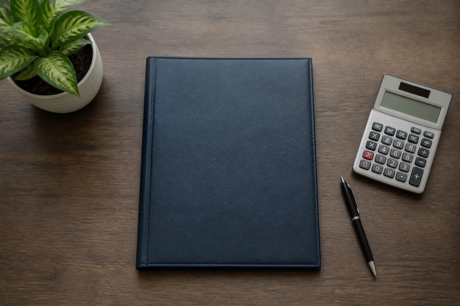 Lending desk with loan binder for the financing step of buying an existing business checklist