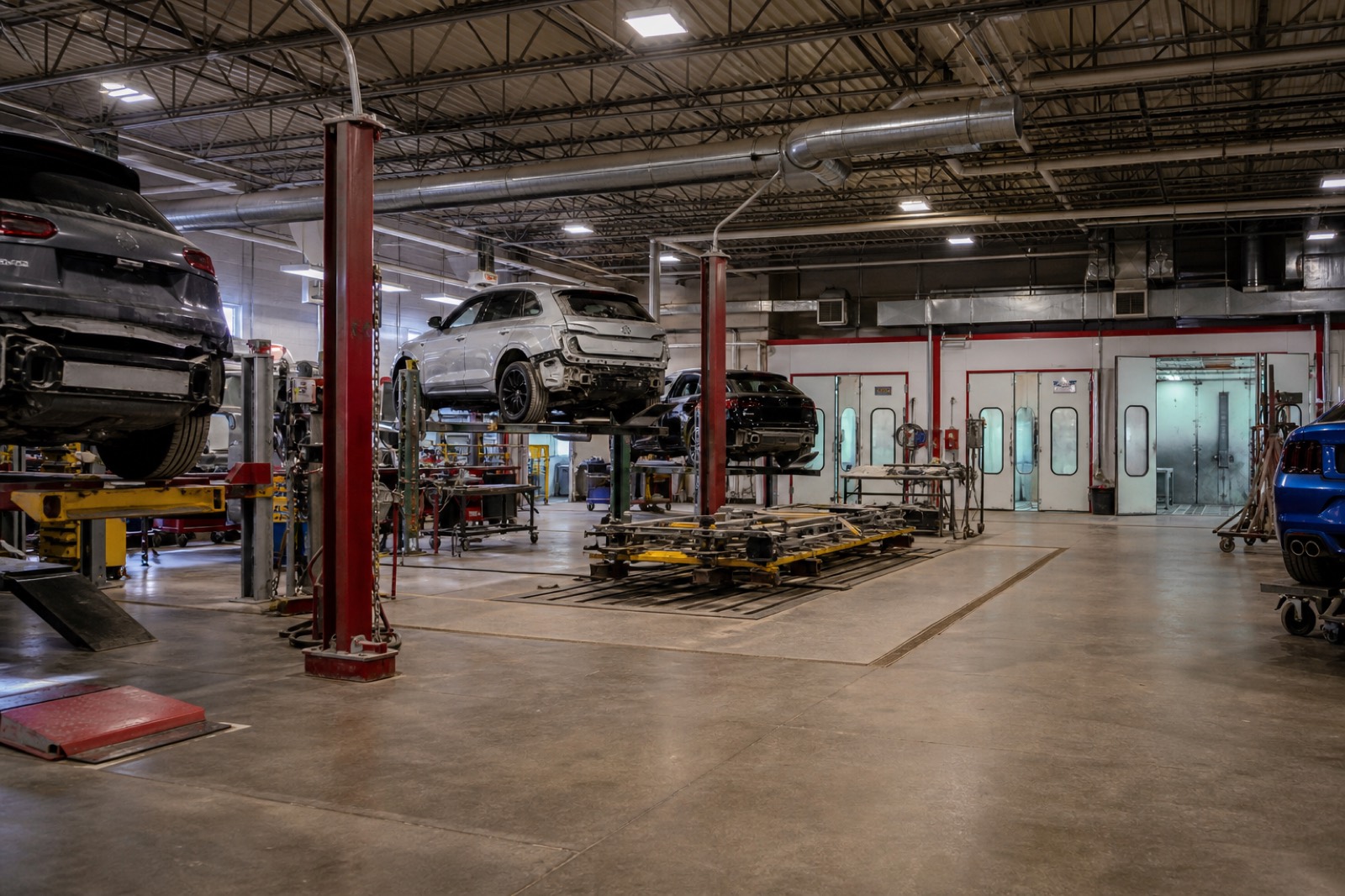 Collision repair center with lifts, the target of collision repair acquisition activity