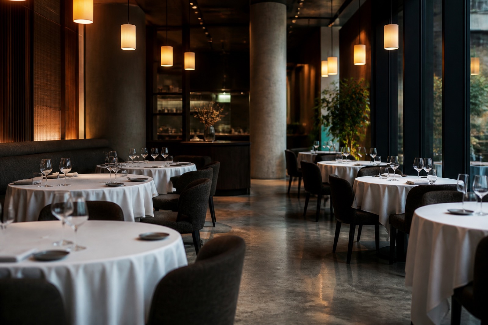 Empty restaurant dining room with set tables before opening